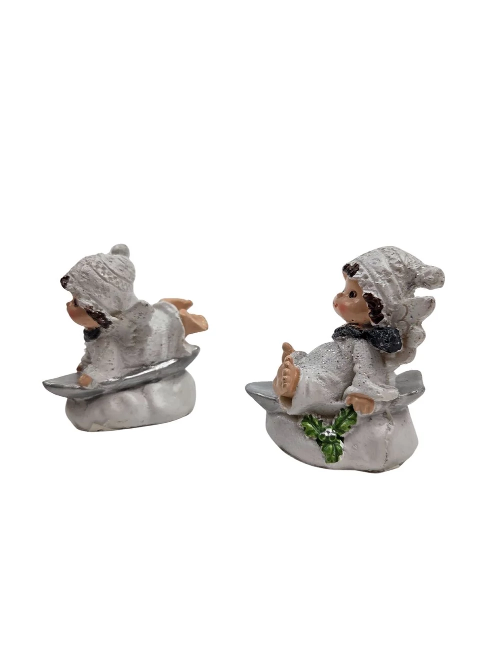 Kép 2/2 - Fehér szárnyas figura felhőn